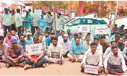 ULB secretariat employees demand promotions before transfers, stages stir
