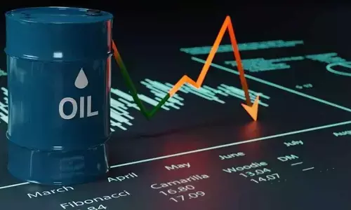 Oil prices tumble to two-week low
