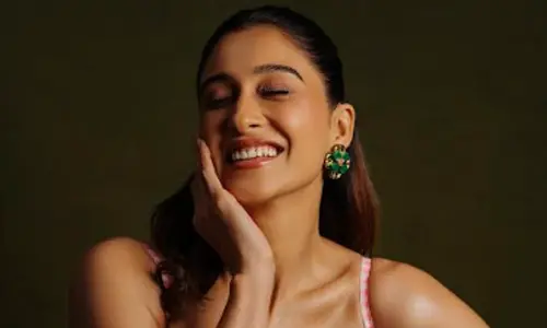 Regina Cassandra radiates playful charm