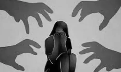 clinic owner held on rape charge