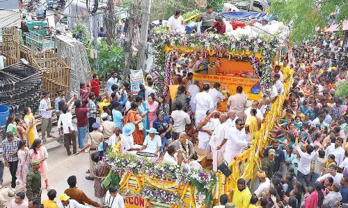 Devotees chant and dance in divine ecstasy