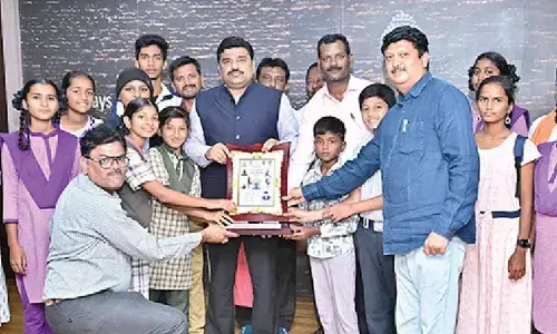 Collector felicitates winners of Yoga Andhra competitions