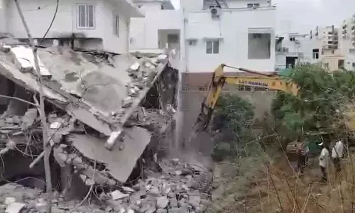 Unauthorised villas razed in Manikonda