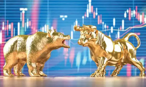 Indices close higher on buying in heavyweights