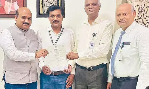 QIS College faculty awarded PhD