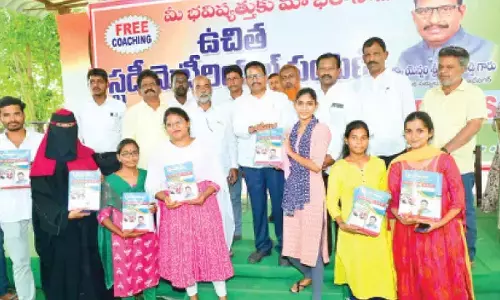 MLA Yennam distributes free study material to govt job aspirants