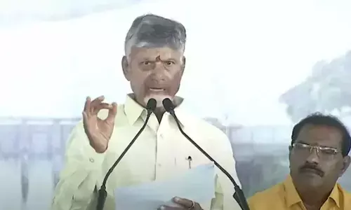 AP CM Chandrababu lifts the gates of Srisailam project to release water