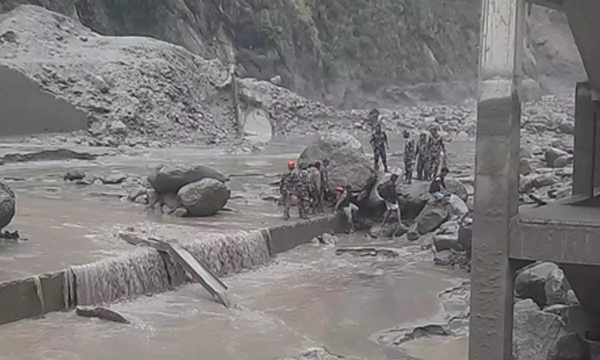 Flash floods wash away Nepal-China trade route, leave 8 dead Flash floods wash away Nepal-China trade route, leave 8 dead