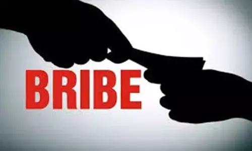 ACB catches official red-handed for taking bribe