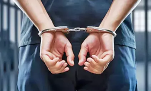 Two held for duping woman of Rs 1.56 cr
