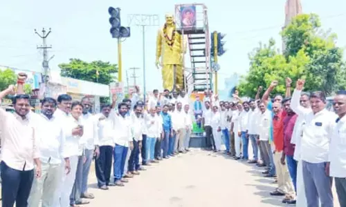 Congress Leaders Celebrate BC Reservation Hike with Milk Abhishekam in Gadwal
