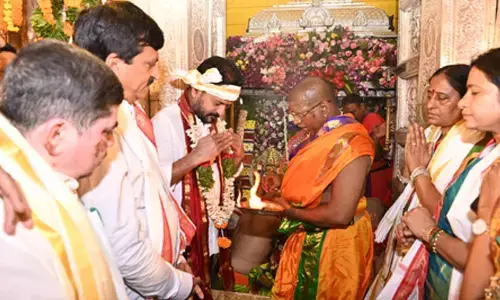 CM Revanth Reddy attends Ujjaini Mahankali Bonalu, offers silk robes
