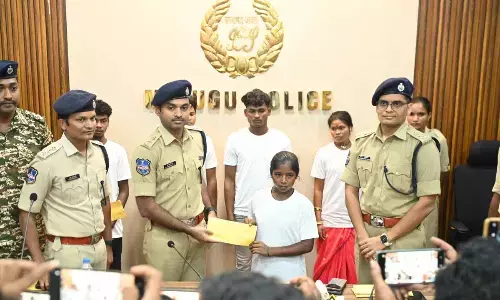 Five members of the banned CPI (Maoist) Party surrendered before the SP of Mulugu district