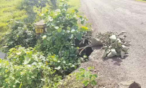Watch out! Caved in road puts motorists’ life in danger