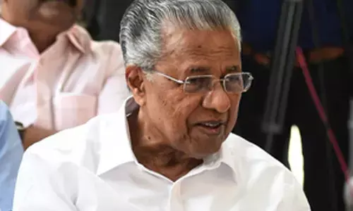 Back to business, CM Vijayan returns from US after medical treatment