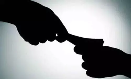 Nellimarla commissioner held in bribe case