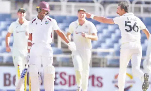 Windies shot out for 27 by fiery Starc and Boland