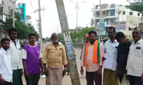 BJP Demands Immediate Removal of Electric Poles from Main Road in Ayija