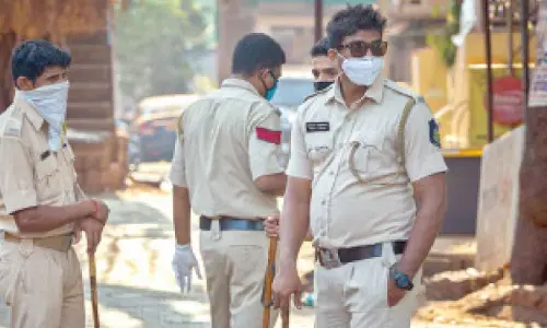 Eleven cops suspended for beating, looting truck driver