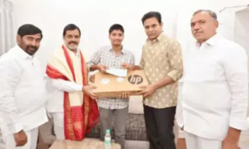 Inspired by KTR, doctor couple donate Rs 1 lakh for educating needy child