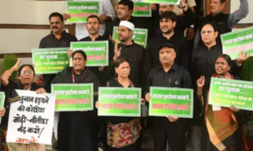 Bihar monsoon session: Oppn protests in black, Deputy CM hits back on voter list row