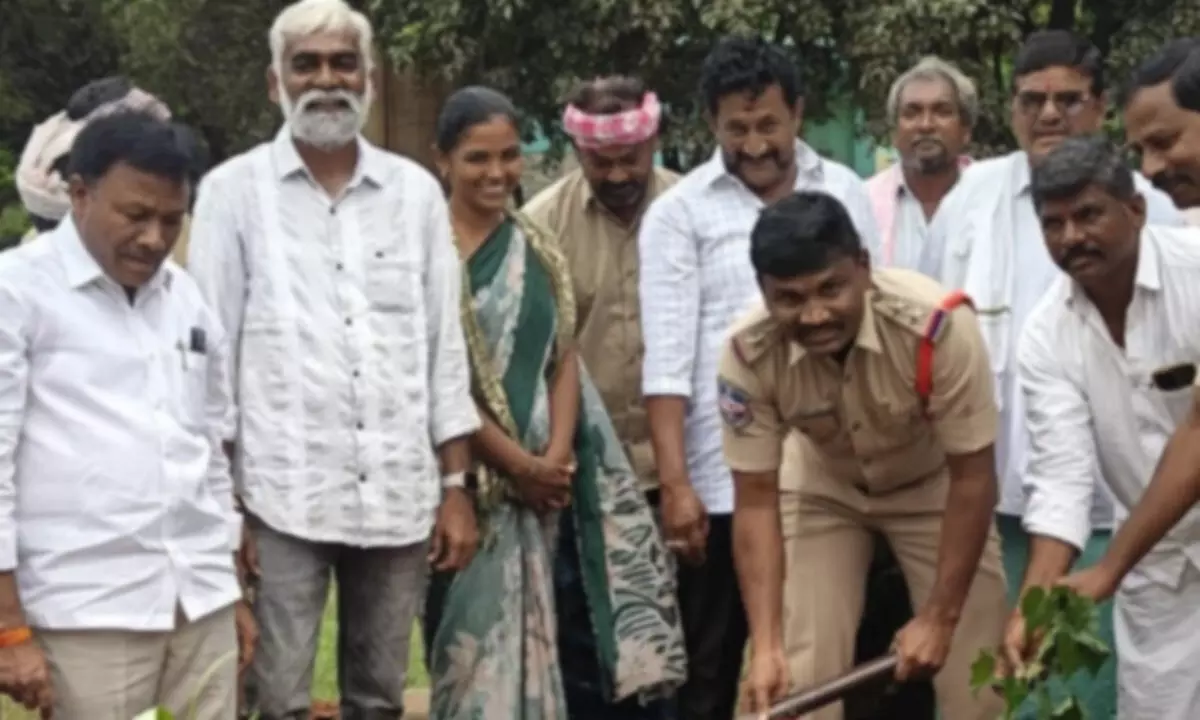 Market Yard Chairman Doddappa Inspects Indiramma Houses, Leads Tree Plantation Drive in Uppal Camp