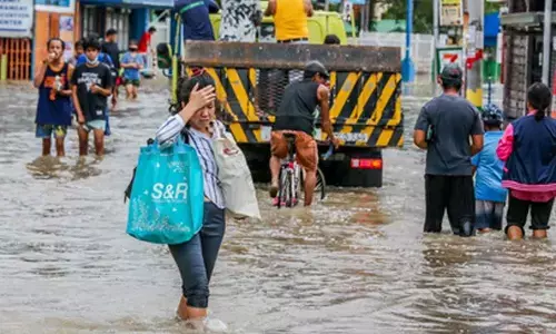 Philippine cyclone death toll rises to 30, seven missing