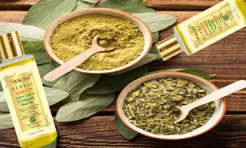 Prevent Early Greys Naturally With This DIY Curry Leaves & Coconut Oil Hair Elixir