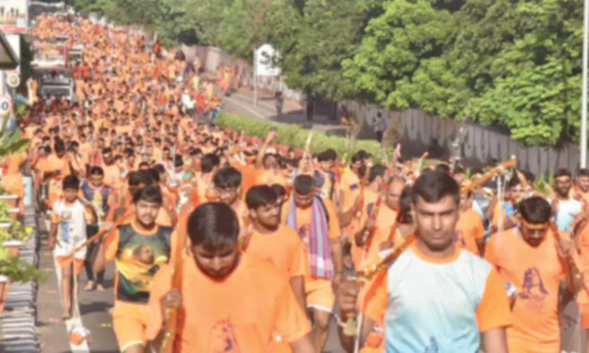 Scores take part in Kavad yatra with gaiety Scores take part in Kavad yatra with gaiety