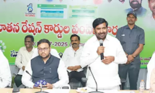 Jagadish Reddy distributes ration cards