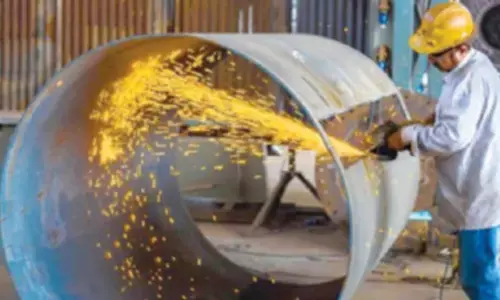 Factory output edges up in June