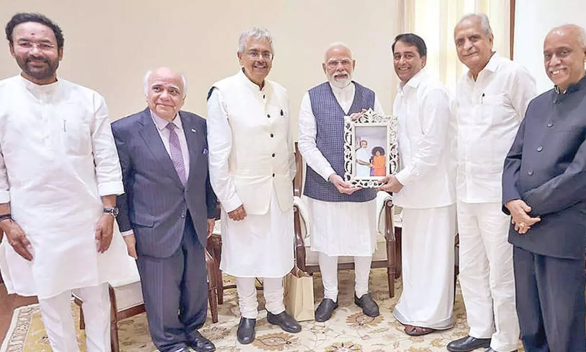PM Modi meets Trustees of Sri Sathya Sai Central Trust PM Modi meets Trustees of Sri Sathya Sai Central Trust