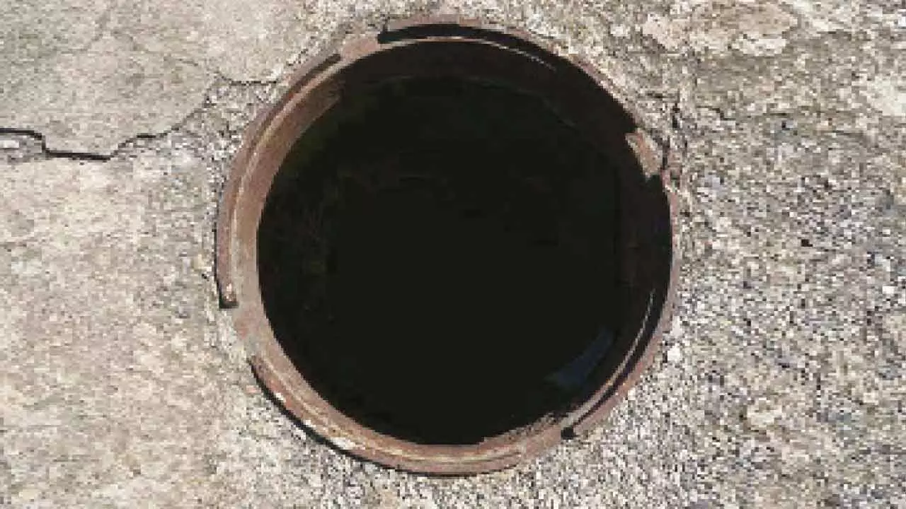 Boy falls into open sewer while playing in rain, crawls out safely Boy falls into open sewer while playing in rain, crawls out safely