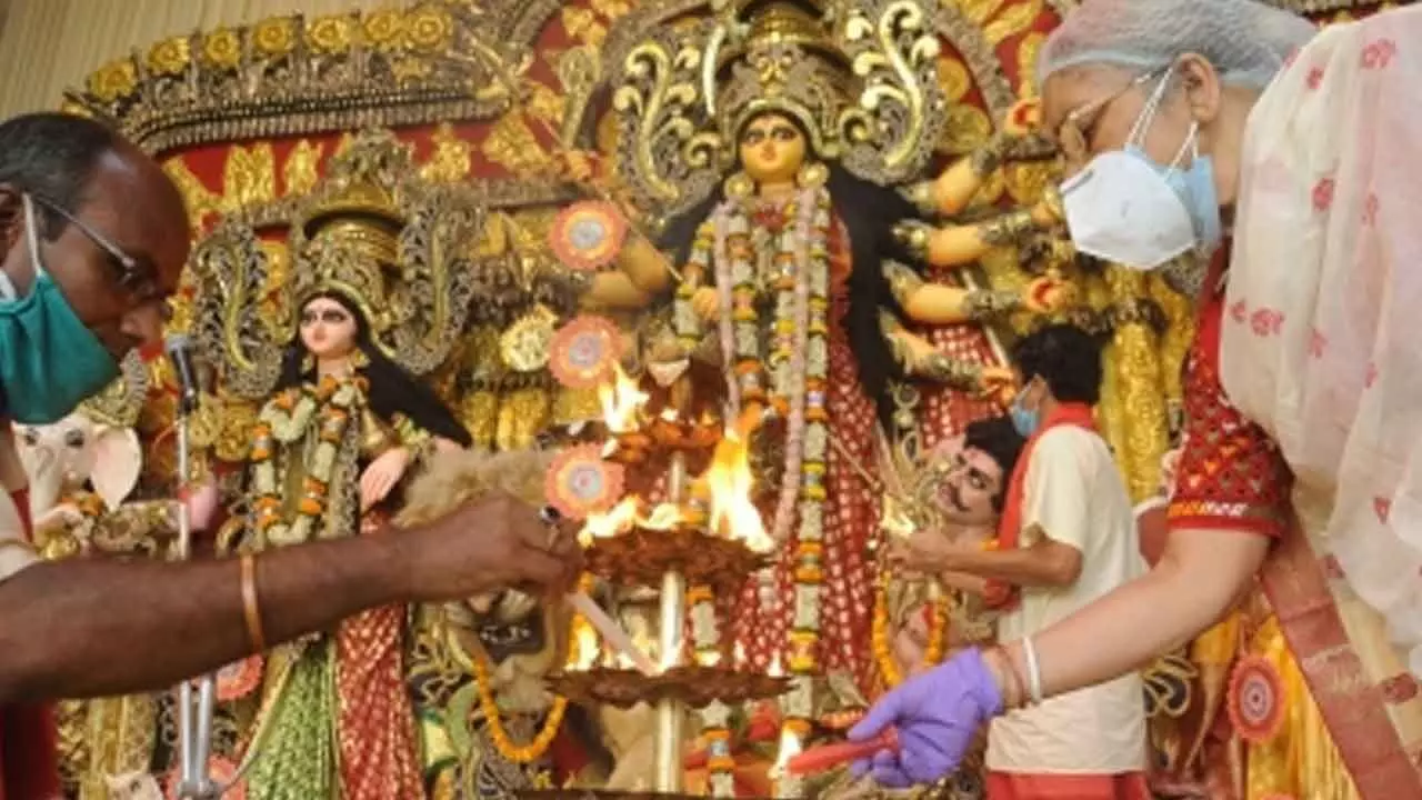 Confusion over actual financial burden on Bengal exchequer for Durga Puja grants Confusion over actual financial burden on Bengal exchequer for Durga Puja grants
