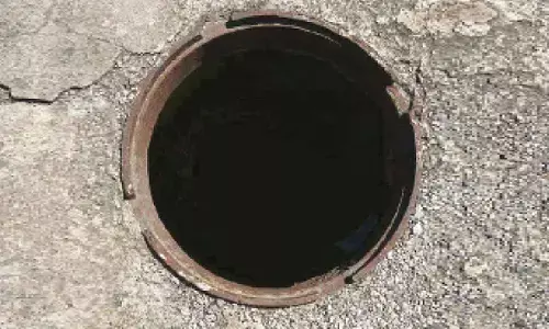 Boy falls into open sewer while playing in rain, crawls out safely