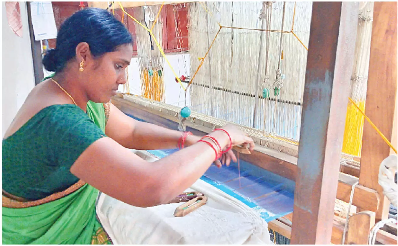 Sircilla woman weaver creates history
