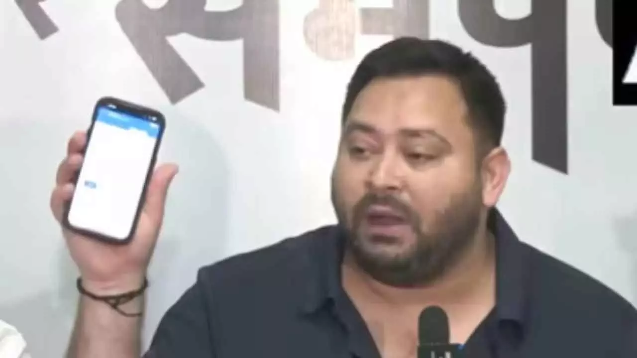 EC asks Tejashwi to hand over his EPIC card for investigation as it was not issued officially EC asks Tejashwi to hand over his EPIC card for investigation as it was not issued officially