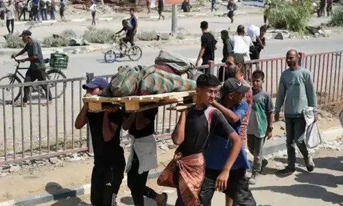 Israeli forces kill over 20 people seeking food in Gaza, say witnesses, health officials