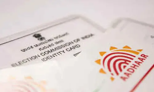Dhami orders legal action against people fraudulently obtaining Aadhaar, voter cards