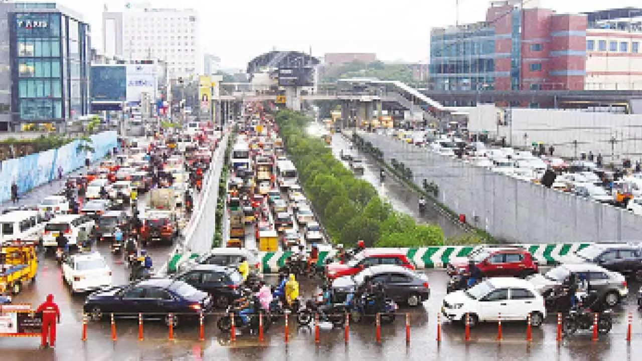 Heavy rain floods Hyd roads Heavy rain floods Hyd roads