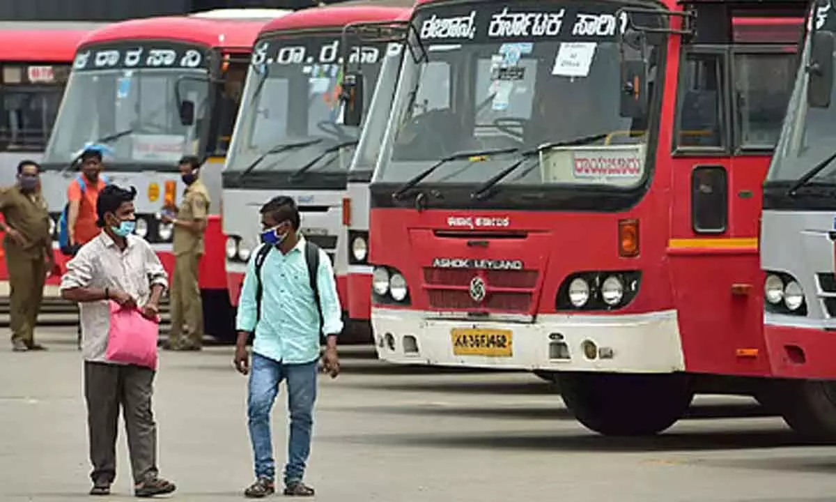 Bus services hit as transport workers begin strike across Karnataka, passengers stranded Bus services hit as transport workers begin strike across Karnataka, passengers stranded
