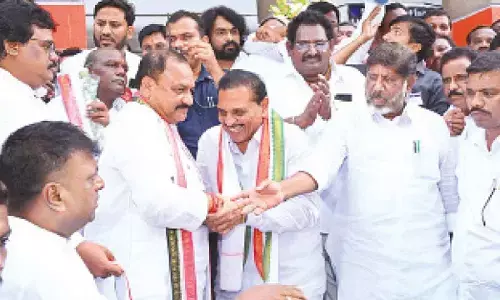Madhira ex-MLA, scores of others join Congress