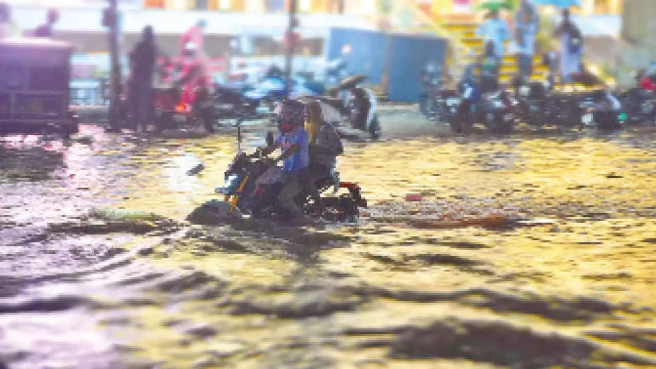 Heavy Rain in Hyderabad Causes Waterlogging and Traffic Jams on Friday Evening