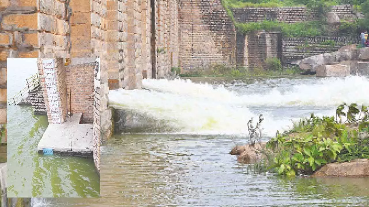 Officials lift 4 crest gates of Himayatsagar Officials lift 4 crest gates of Himayatsagar