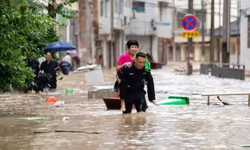 Rainstorms force evacuation of over 15,000 residents in Chinas Chongqing