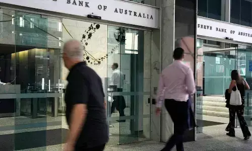 Australias central bank cuts interest rate for third time this year to 3.6%