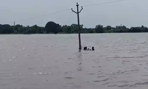 Lineman Braves Adverse Conditions to Restore Power in Siddipet Pond