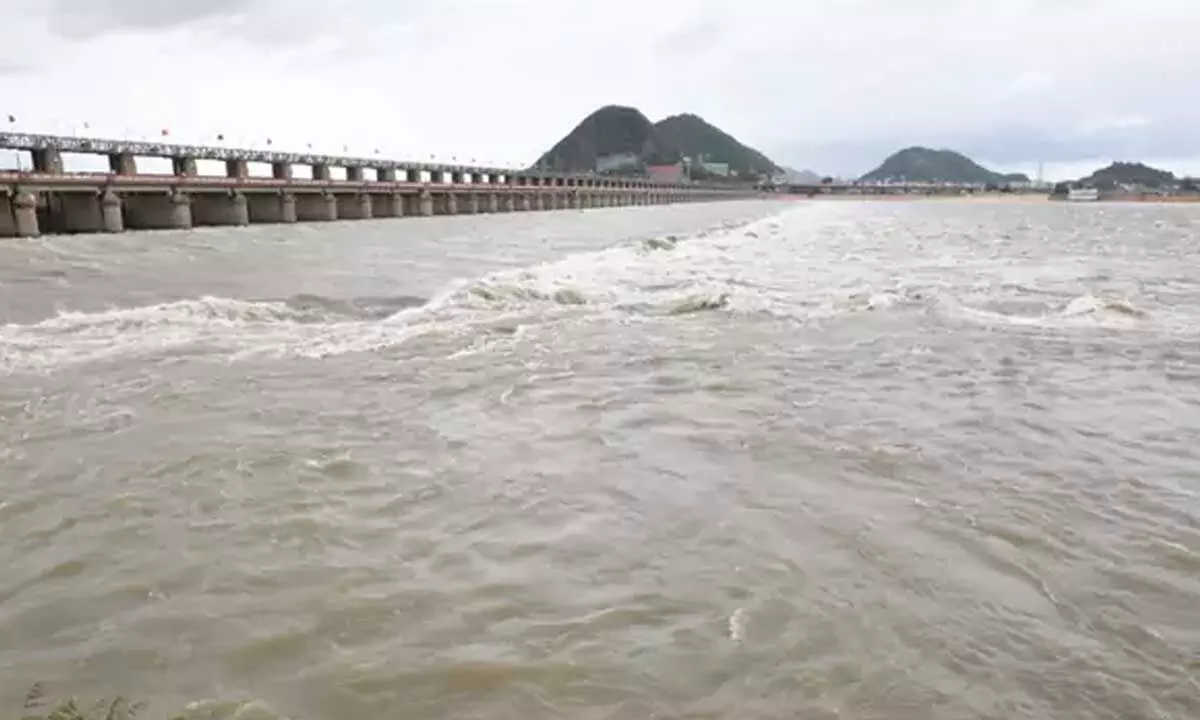 Krishna river overflows at Prakasam barrage, first danger warning issued Krishna river overflows at Prakasam barrage, first danger warning issued