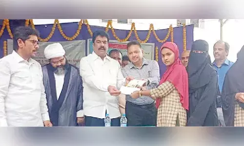 MLA distributes school books