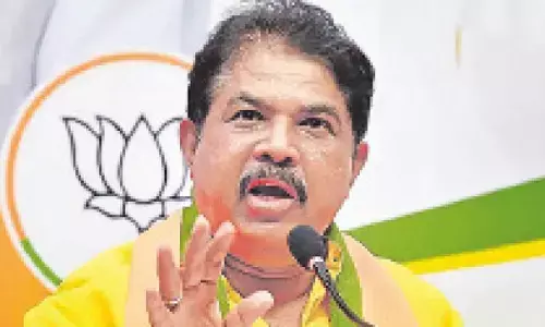 LoP slams Congress over pothole-ridden roads